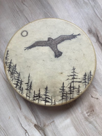 Native made hand drum. Drawing by Female NB Artist.