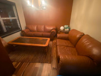 Leather sofa and love seat, matching tables