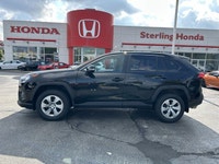 Command the road in this sleek 2023 Toyota RAV4 LE, boasting a Midnight Black Metallic exterior that... (image 7)