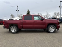 AMVIC Licensed Dealer This 2018 Chevrolet Silverado 1500 2LT is finished in striking Cajun Red Tintc... (image 8)