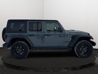 This 2026 JEEP WRANGLER 4-DOOR SPORT has the following options Cloth Low-Back Bucket Seats, Remote S... (image 5)