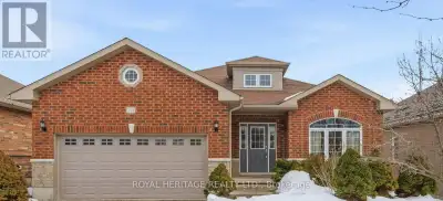 Welcome Home! Perched in the highly desirable Parkview Hills Estate, this all-brick bungalow offers...
