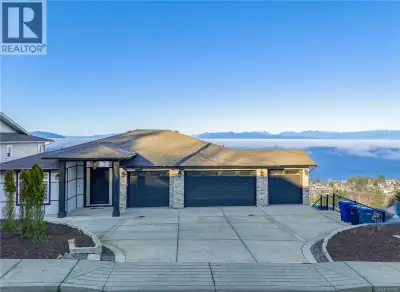 Discover an exceptional luxury residence in the prestigious community of North Nanaimo, set on a rar...