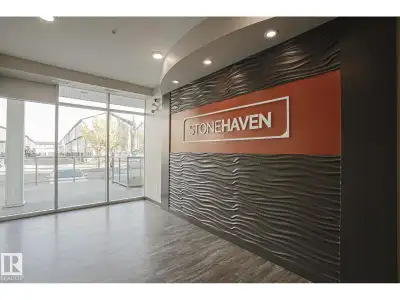 One of south Edmonton's most desirable spots! VILLAGE AT WALKER LAKES! Beautiful upgraded corner uni...