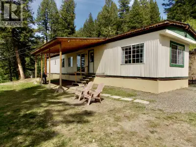 Lovely Mobile Home nestled on 13.9 Acre Property overlooking gorgeous Chimney Valley Ranchland! Offe...