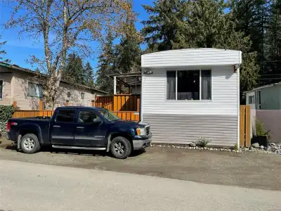 Live a vacation lifestyle daily! This 2 bedroom, 2 bath extra wide 792 sqft mobile is situated in a...