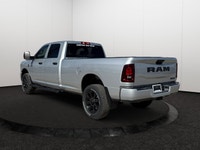 This 2026 RAM 2500 TRADESMAN CREW CAB 4X4 has the following options Cloth 40/20/40 Bench Seat, 8.4 T... (image 3)