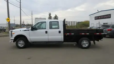 2014 Ford F-350 Flatbed Truck 4X4 Low Km's AMVIC LICENSED..... Ask for Special Financing & Leasing d...