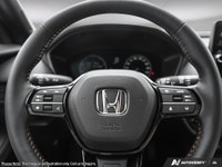 Get behind the wheel of the vibrant red 2027 Honda HR-V Sport AWD, engineered for all-weather condit... (image 9)