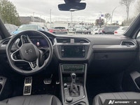 This Volkswagen Tiguan delivers a Intercooled Turbo Regular Unleaded I-4 2.0 L/121 engine powering t... (image 9)