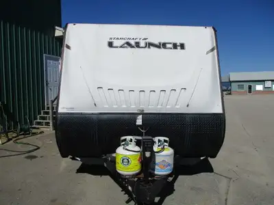 A lightweight family unit with a front queen bedroom , two rear corner double bunks , slide w/fold d...