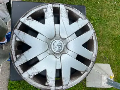 Lovely Toyota Camry Hubcap. Back ring is in perfect condition. Costs over $150 plus HST at Stealersh...