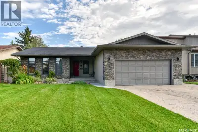Solid updated bungalow this eye catching stucco and stack stone front exterior is just the beginning...
