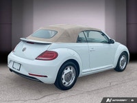2018 Volkswagen Beetle Convertible La Volkswagen Beetle décapotable 2018 est une voiture emblématiqu... (image 4)