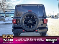 This Jeep Wrangler delivers a Gas/Electric V-6 3.6 L/220 engine powering this Automatic transmission... (image 5)