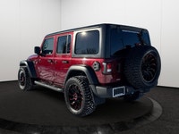 Experience the ultimate fusion of classic Wrangler ruggedness and sleek, modern styling in this trai... (image 3)