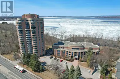 This thoughtfully designed 3-bedroom, 2-bathroom main-floor condo with a private terraced balcony mi...