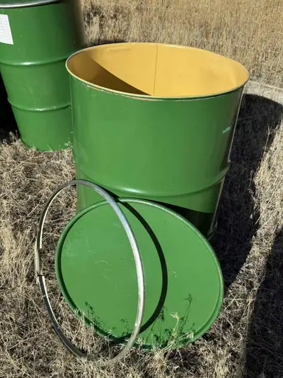 Used 45 gallon barrels. Good condition, clean, comes with lid and lever lock ring. Great for storage...