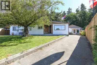 Updated, spacious rancher-style home with beautiful mountain views and an incredibly private backyar...