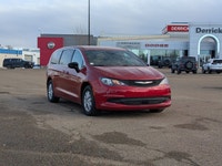 The 2026 Chrysler Grand Caravan SXT in Red Hot Pearl with a Black interior offers a bold look, spaci... (image 8)