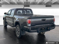 Experience proven reliability and rugged capability with the *2021 Toyota Tacoma*, featuring *143,96... (image 3)