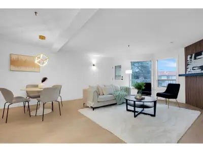 Bright and spacious 2 bed + den, 2 bath corner unit offering nearly 1,200 sq ft on a quiet dead-end...