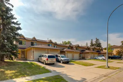 Amenities: Attached Garage • Outdoor Space • Spacious Rooms Suite & Building: Three-bedroom upgraded...