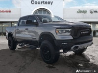 Dominate every road and task in this robust 2021 Ram 1500 Rebel Crew Cab Pickup. Dressed in striking... (image 7)