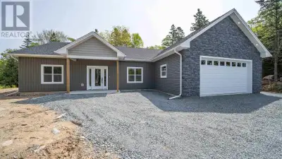 Welcome to your dream home- a meticulously crafted new construction bungalow nestled on a serene and...