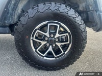 Embrace boundless adventure in this rugged 2025 Jeep Wrangler Rubicon Convertible. Presented in a st... (image 6)