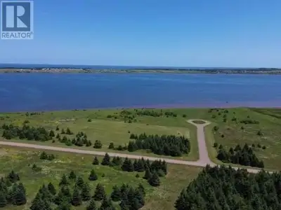 Welcome to an exceptional 0.88-acre ocean view lot in the sought-after Seaside Estates, offering bre...