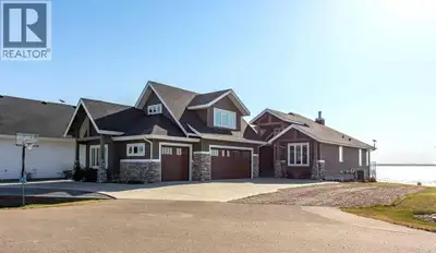 Wake up to picturesque views of Buffalo Lake, spend your afternoons relaxing on the beach or in the...