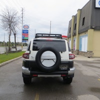 This 2013 Toyota FJ Cruiser offroad 4WD model, adding Bilstein shock absorbers, traction control upd... (image 8)