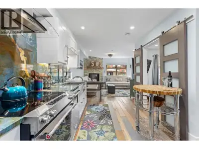 Discover this stunningly renovated Creekside retreat, just steps from the gondola. The gourmet kitch...