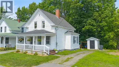 Step into this beautifully refreshed 1.5 storey home, built in 1920 and brimming with personality! F...