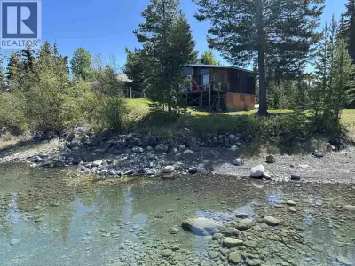 Rare Green Lake waterfront on over an acre of level, usable land! This 2-bed, 1-bath cabin with well...