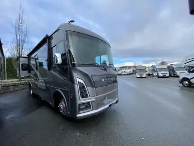 Winnebago Vista Class A gas motorhome 33K highlights: Full Wall Slide Bath and a Half King Bed Dinet...