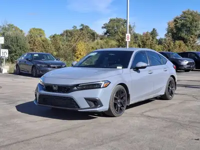 Look at this certified 2022 Honda Civic Hatchback Sport Touring | 6-Speed Manual | Leather | Sunroof...
