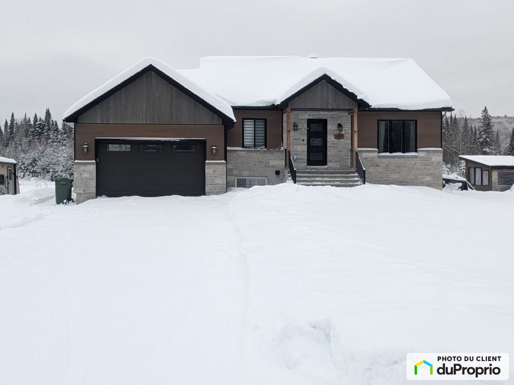 $599,999 - Bungalow for sale in Lantier — photo 1