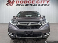 The 2018 Honda CR-V Touring AWD delivers premium comfort, advanced safety, and confident all-weather... (image 8)