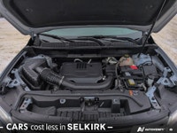 The 2022 GMC Acadia SLT AWD is a versatile and capable midsize SUV perfect for families and everyday... (image 9)