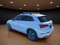 The 2021 Audi Q5 Komfort 45 TFSI quattro boasts a stunning white exterior that is both timeless and... (image 7)
