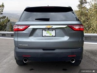 Command the road with this 2021 Chevrolet Traverse LS. Boasting a powerful 3.6L V6 engine delivering... (image 3)