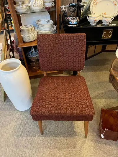 Gorgeous chocolate brown chair with textured upholstery