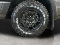 Meet the 2026 Ram 1500 Rebel 4x4 Crew Cab 57 Box: a commanding presence in a refined gray shade. Bui... (image 8)