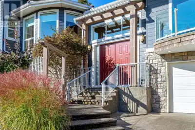Experience breathtaking ocean and city views from this custom-built rancher in Nanoose Bay, perched...