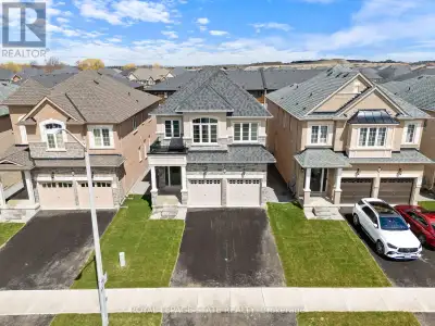 Welcome to luxury living in the heart of Stoney Creeks prestigious "On The Ridge" community! This br...