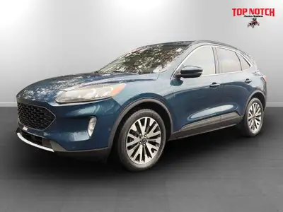 This 2020 Ford Escape Titanium Hybrid features a 4-cylinder hybrid engine paired with an automatic t...