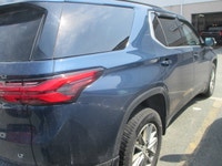 Finished in blue with a black interior, this used 2023 Chevrolet Traverse LT Cloth is a roomy midsiz... (image 3)