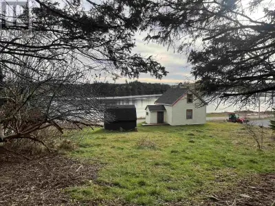 Beautiful property in River Bourgeois. Property runs from #4 to Northside Road and has a lovely litt...